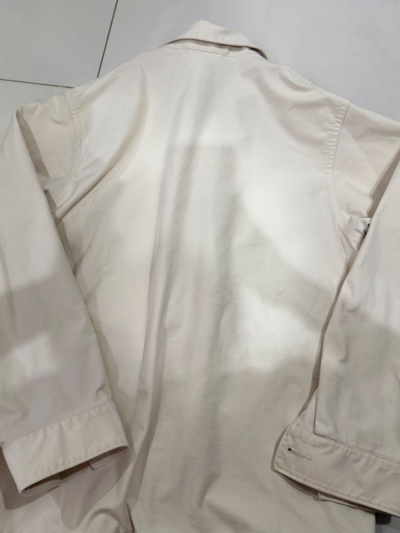 UNIQLO Cream Utility Overshirt / Jacket (Category: Coats, Jackets and Outerwear) located in Manila. Submitted by buymiclothes.47 (Listing ID 1470335753, Image 3). Description: UNIQLO Cream Utility Overshirt / Jacket | Size S Preloved UNIQLO long-sleeve overshirt in an off-white/cream color 🤍 * Size S * Button-front closure * Two flap chest pockets * Collared neckline * Long sleeves with button cuffs * Structured cotton-blend fabric * Can be worn