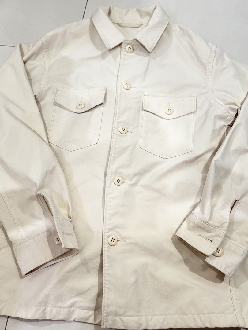 UNIQLO Cream Utility Overshirt / Jacket (Category: Coats, Jackets and Outerwear) located in Manila. Submitted by buymiclothes.47 (Listing ID 1470335753, Image 2). Description: UNIQLO Cream Utility Overshirt / Jacket | Size S Preloved UNIQLO long-sleeve overshirt in an off-white/cream color 🤍 * Size S * Button-front closure * Two flap chest pockets * Collared neckline * Long sleeves with button cuffs * Structured cotton-blend fabric * Can be worn