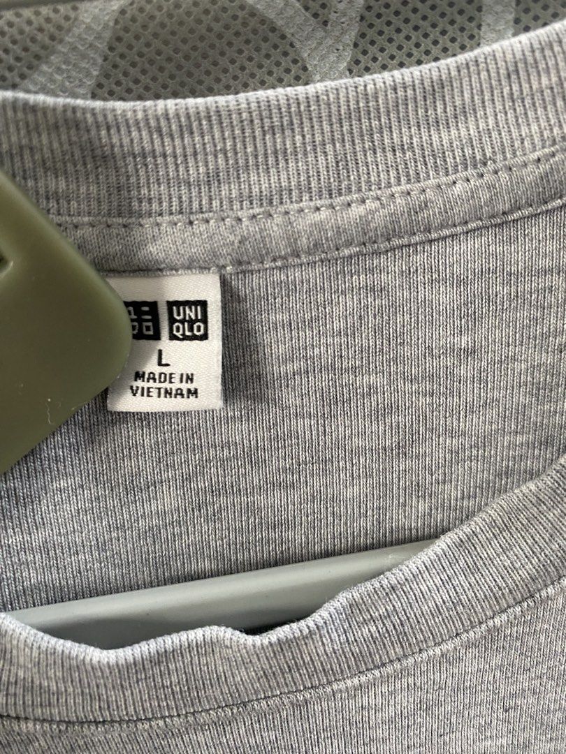 Uniqlo Grey T-Shirt Size L (Category: Shirts) located in Rizal. Submitted by Shortlisted (Listing ID 1470144544, Image 3). Description: - Brand: Uniqlo - Color: Grey - Size: L (Made in Vietnam) - Semi-crop.