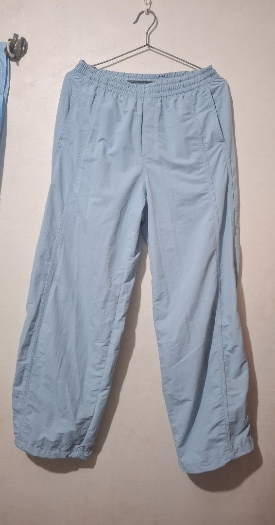 Uniqlo Light Blue Nylon Pants Size L (Category: Trousers) located in Manila. Submitted by annasigrid33015 (Listing ID 1470276521, Image 1). Description: - Brand: Uniqlo - Item: Nylon Pants - Color: Light Blue - Size: L (Waist: 69-75cm, Hips: 94-100cm) - Waistband: Elastic with adjustable drawstring - Pockets: Functional mesh pockets - Lining: Comfortable inner mesh lining - Material: Lightweight and breathable - Ideal for: Casual wear and outdoor