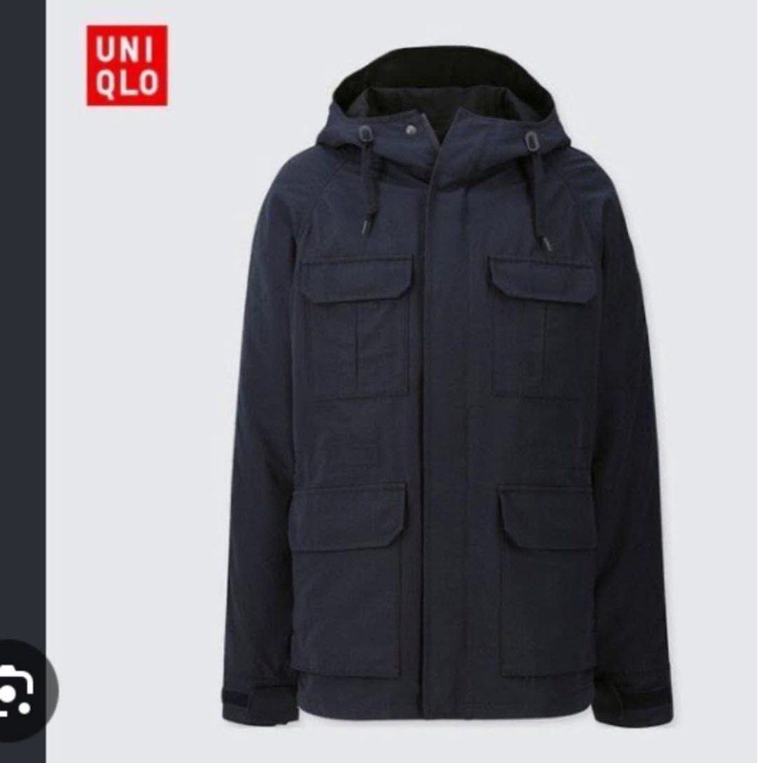 UNIQLO Men Mountain Parka Navy (Category: Coats, Jackets and Outerwear) located in Roxas City. Submitted by shinebusquitvgo (Listing ID 1470264689, Image 3). Description: - Brand: Uniqlo - Item: Mountain Parka / Windbreaker - Color: Dark Navy Blue with black inner lining - Closure: Full zip front with snap button storm flap - Storage: 4 front flap pockets - Fit adjustments: Drawstring hood and waist, plus adjustable velcro sleeve cuffs.