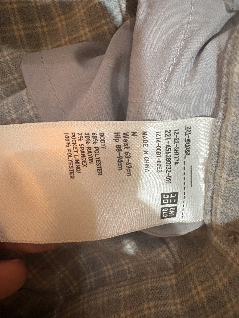 Uniqlo Plaid Wrap Skort (Category: Skirts) located in Dasmarinas. Submitted by littleczarmer (Listing ID 1470279017, Image 2). Description: - Brand: Uniqlo - worn once - Item: Blue/greyish plaid wrap skort - Size: M (Fits waist 63-69cm, hip 88-94cm) - Design: Chic wrap skirt look with built-in shorts for comfort and practicality - Closure & Fit: Side button closure with an elastic waistband at the back - Material: 68% polyester, 30% rayon, 2% spa