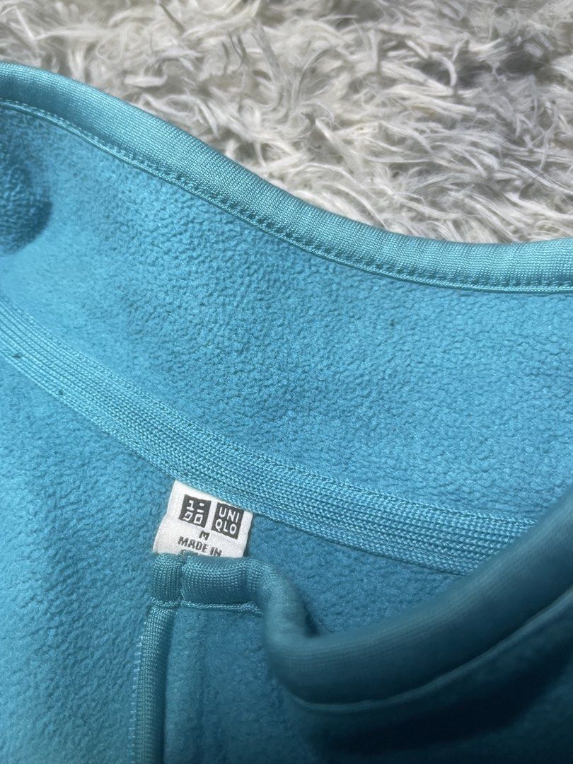 Uniqlo Quarter Zip Fleece Pullover Blue Size M (Category: Coats, Jackets and Outerwear) located in Manila. Submitted by kyyyyyih (Listing ID 1470287822, Image 2). Description: - Brand: Uniqlo - Item: Light blue fleece pullover with quarter-zip high neck - Details: Dark blue horizontal chest and matching arm stripes - Size: Medium - Fabric: Soft and cozy fleece.
