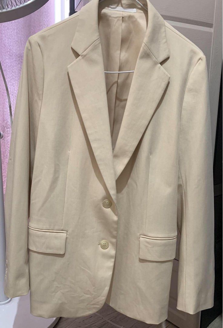 Uniqlo Relaxed Tailored Jacket Cream Size S (Category: Coats, Jackets and Outerwear) located in Manila. Submitted by sansathequeen_1 (Listing ID 1470283030, Image 1). Description: - Brand: Uniqlo - Item: Relaxed Tailored Jacket - Color: Cream - Size: Small - Material: 66% polyester, 29% rayon, 5% spandex (fully lined) - Features: Two-button closure, front flap pockets, clean silhouette - Condition/Style: Great basic layer for office or smart casu