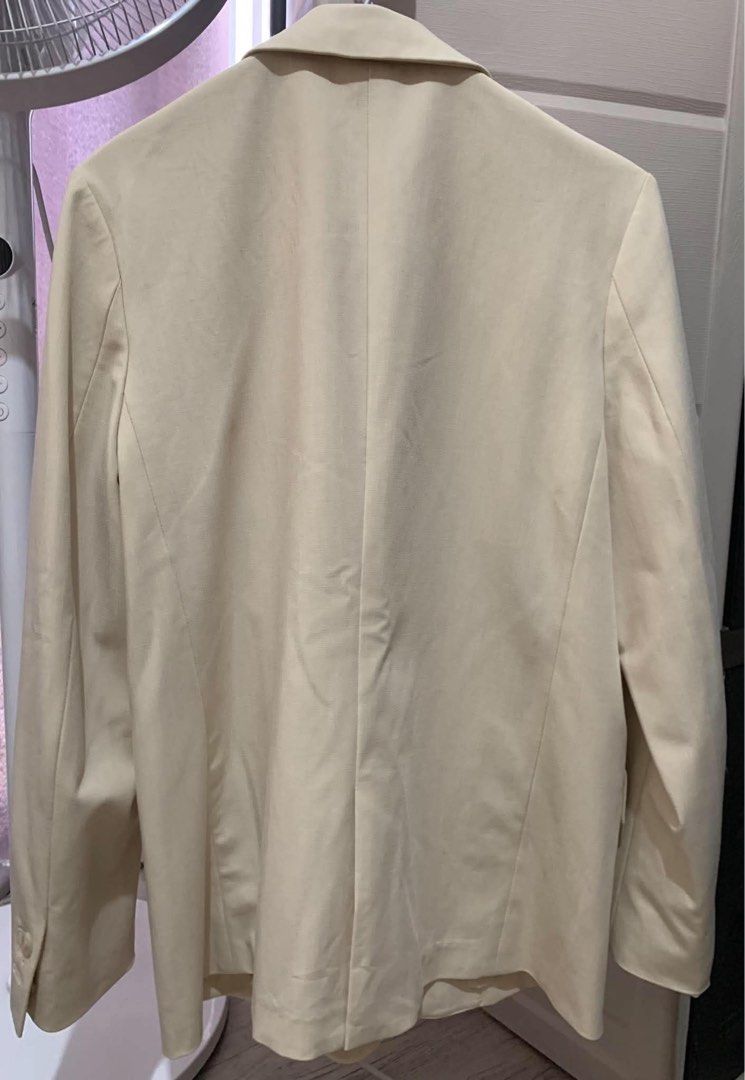 Uniqlo Relaxed Tailored Jacket Cream Size S (Category: Coats, Jackets and Outerwear) located in Manila. Submitted by sansathequeen_1 (Listing ID 1470283030, Image 2). Description: - Brand: Uniqlo - Item: Relaxed Tailored Jacket - Color: Cream - Size: Small - Material: 66% polyester, 29% rayon, 5% spandex (fully lined) - Features: Two-button closure, front flap pockets, clean silhouette - Condition/Style: Great basic layer for office or smart casu
