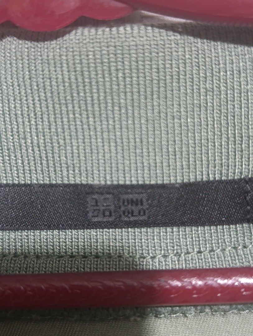 Uniqlo Sage Green Bomber Jacket Size M (Category: Coats, Jackets and Outerwear) located in Manila. Submitted by avicmbe (Listing ID 1470166279, Image 3). Description: - Brand/Model: Uniqlo bomber jacket - Color: Sage green - Size: Medium (standard fit) - Material: Comfortable cotton, polyester, and spandex blend - Features: Zip-up front, side pockets, ribbed collar, cuffs, and hem - Condition: Lightweight, clean inside and out, ready to wear.