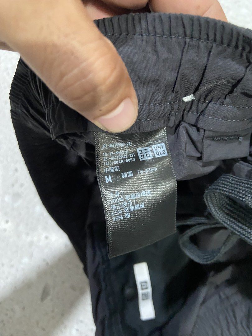Uniqlo U Black Cargo Shorts Size M (Category: Shorts) located in Calumpit. Submitted by Ketchi (Listing ID 1470263790, Image 3). Description: - Brand: Uniqlo U - Color: Classic Black - Size: M (fits waist 76-84cm) - Material: Lightweight nylon blend - Design: Utility style with large side cargo pockets - Waistband: Elastic with drawstring and button closure - Condition: Clean with tags intact inside - Style: Great everyday casual streetwear.