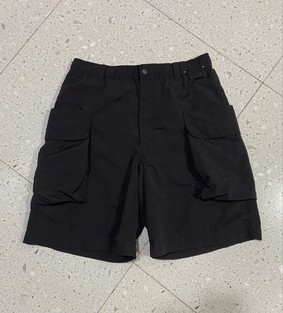 Uniqlo U Black Cargo Shorts Size M (Category: Shorts) located in Calumpit. Submitted by Ketchi (Listing ID 1470263790, Image 1). Description: - Brand: Uniqlo U - Color: Classic Black - Size: M (fits waist 76-84cm) - Material: Lightweight nylon blend - Design: Utility style with large side cargo pockets - Waistband: Elastic with drawstring and button closure - Condition: Clean with tags intact inside - Style: Great everyday casual streetwear.