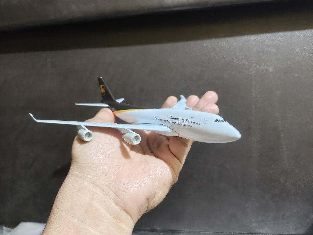 UPS Boeing 747 Diecast Model Airplane with Display Stand (Category: Vehicle & Diecast Models) located in Manila. Submitted by cosmiccrystal.332193 (Listing ID 1470313961, Image 2). Description: For Sale: UPS Boeing 747-8 Freighter Diorama (Complete Set) Size: 1:300 Inclusions: Plane, UPS bear mascot toy, and display stand. Price: P2,500 Up for meetup or delivery.