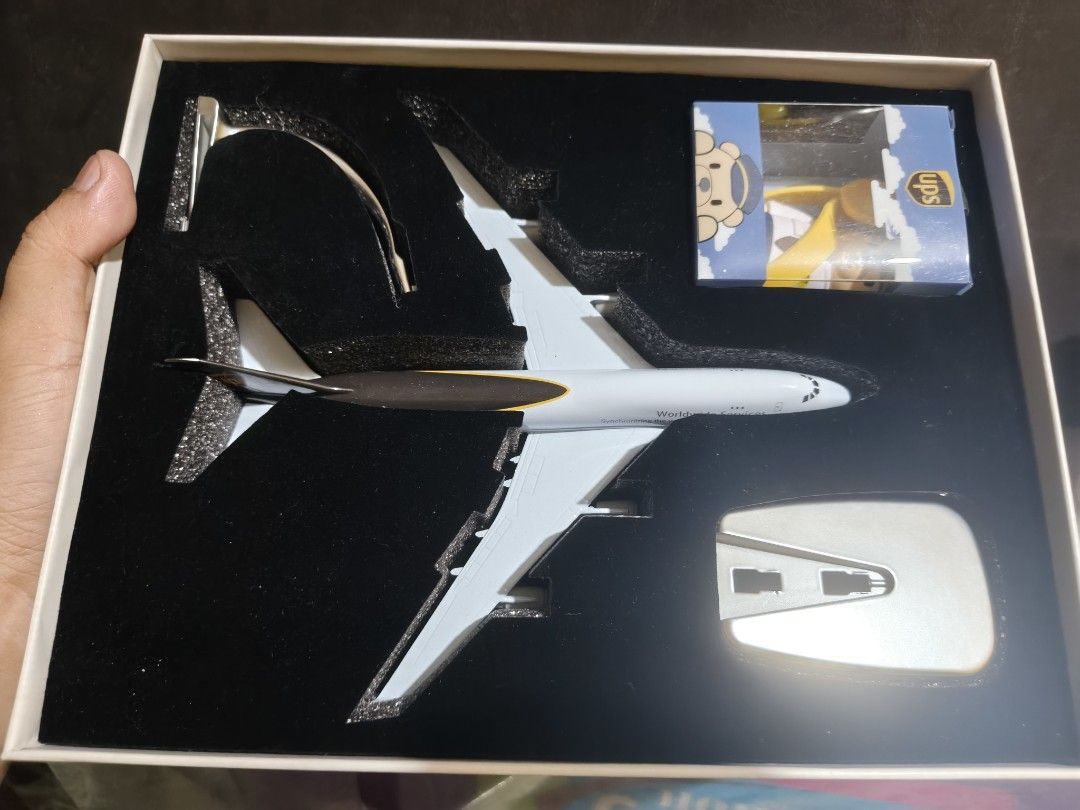 UPS Boeing 747 Diecast Model Airplane with Display Stand (Category: Vehicle & Diecast Models) located in Manila. Submitted by cosmiccrystal.332193 (Listing ID 1470313961, Image 3). Description: For Sale: UPS Boeing 747-8 Freighter Diorama (Complete Set) Size: 1:300 Inclusions: Plane, UPS bear mascot toy, and display stand. Price: P2,500 Up for meetup or delivery.