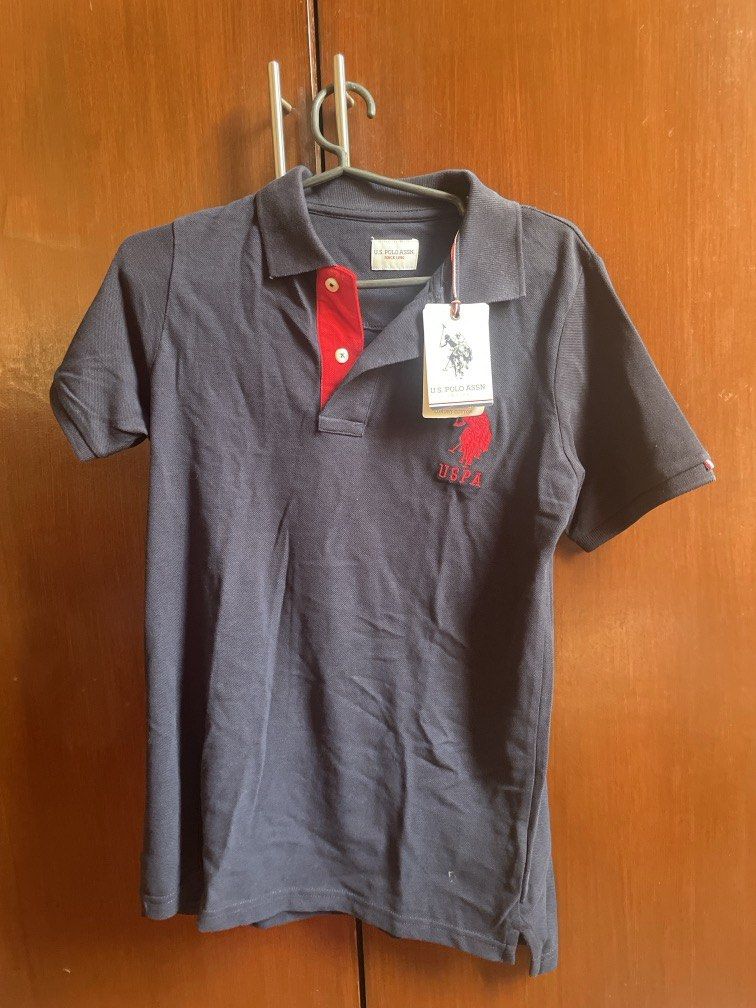 Uspa navy polo shirt (Category: Shirts) located in Dinalupihan. Submitted by closetbymint (Listing ID 1470153841, Image 1). Description: .