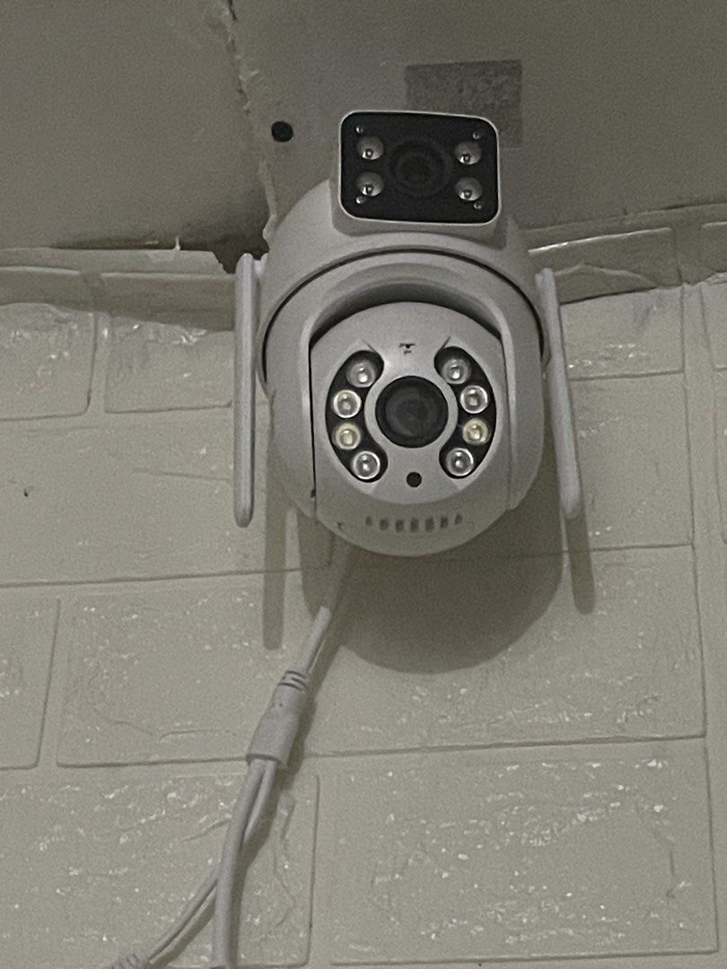 V380 Dual Lens CCTV Camera (Category: Security Systems & CCTV Cameras) located in Manila. Submitted by mai1246 (Listing ID 1470328301, Image 1). Description: - Model: V380 Dual Lens Security Camera - Color: White with dual antennas and dual camera modules - Condition: Pre-owned, pulled down from previous setup, and ready to install - Compatibility: Works seamlessly with the V380 Pro app - Inclusions: Complete with power adapter and cabling setup 