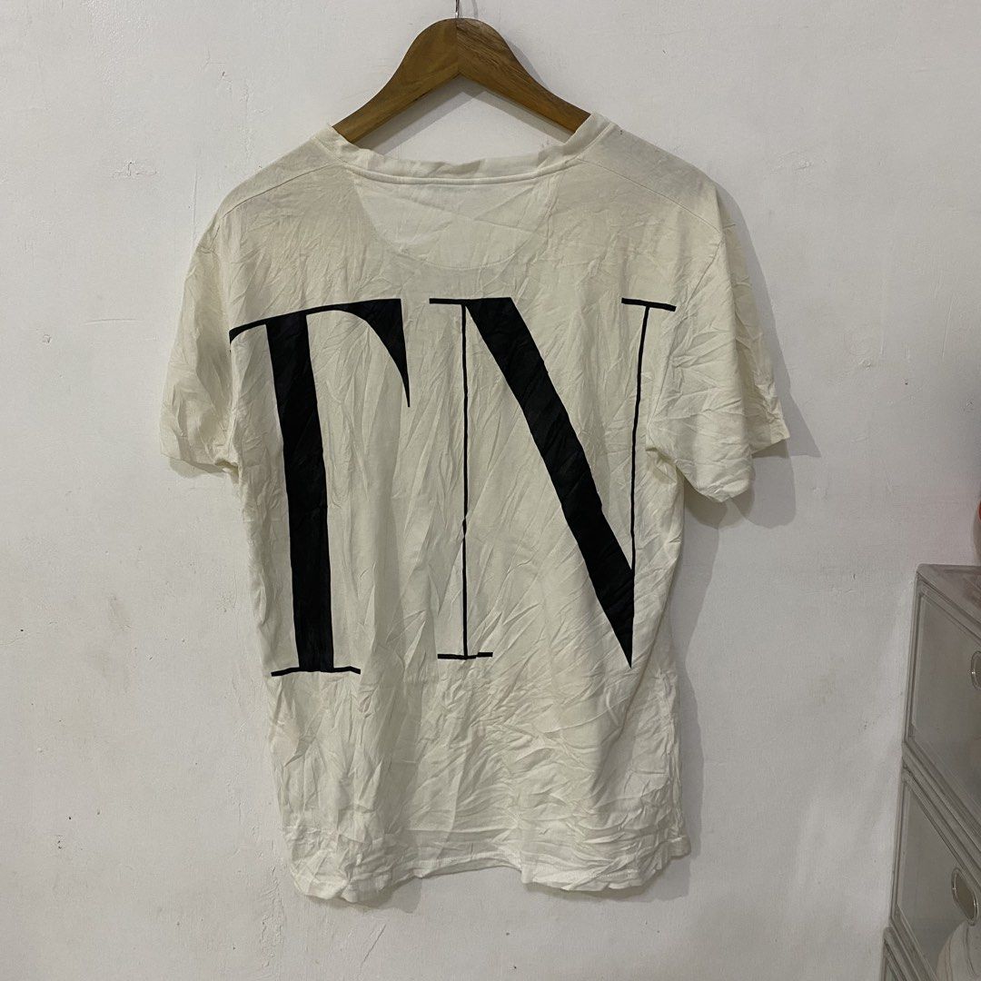 Valentino Garavani VLTN Tshirt (Category: Tshirts & Polo Shirts ) located in Las Pinas. Submitted by declutter_thing69 (Listing ID 1470186185, Image 2). Description: Valentino Garavani VLTN Tshirt Small Good condish width 18 inches length 27 inches shoulder 18 inches sleeve 8 inches.