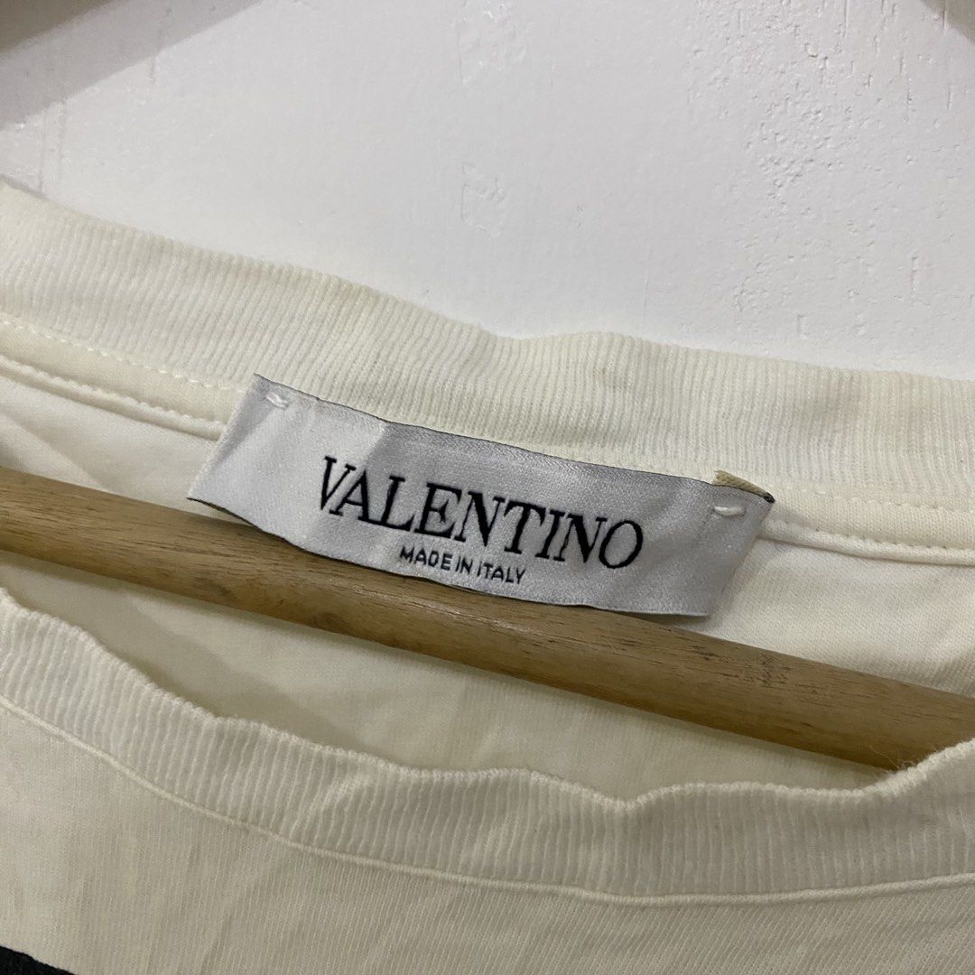 Valentino Garavani VLTN Tshirt (Category: Tshirts & Polo Shirts ) located in Las Pinas. Submitted by declutter_thing69 (Listing ID 1470186185, Image 3). Description: Valentino Garavani VLTN Tshirt Small Good condish width 18 inches length 27 inches shoulder 18 inches sleeve 8 inches.