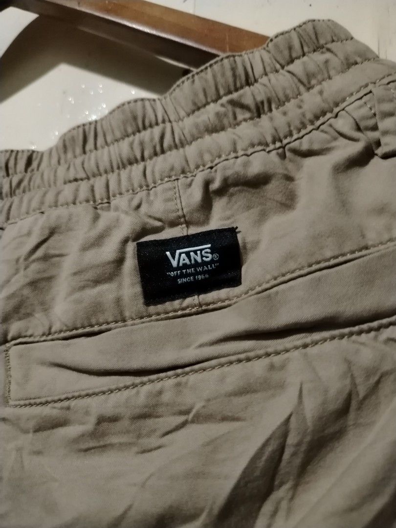Vans Khaki Drawstring Shorts (Category: Shorts) located in Caloocan City. Submitted by vincefresn21903 (Listing ID 1470278248, Image 3). Description: - Brand: Vans - Color: Khaki - Style: Simple everyday casual wear - Waistband: Elastic with matching drawstring closure - Pockets: Two side pockets - Details: Small black Vans tag on the left hem - Material: Lightweight and comfortable fabric - Condition: Brand new/Mint.