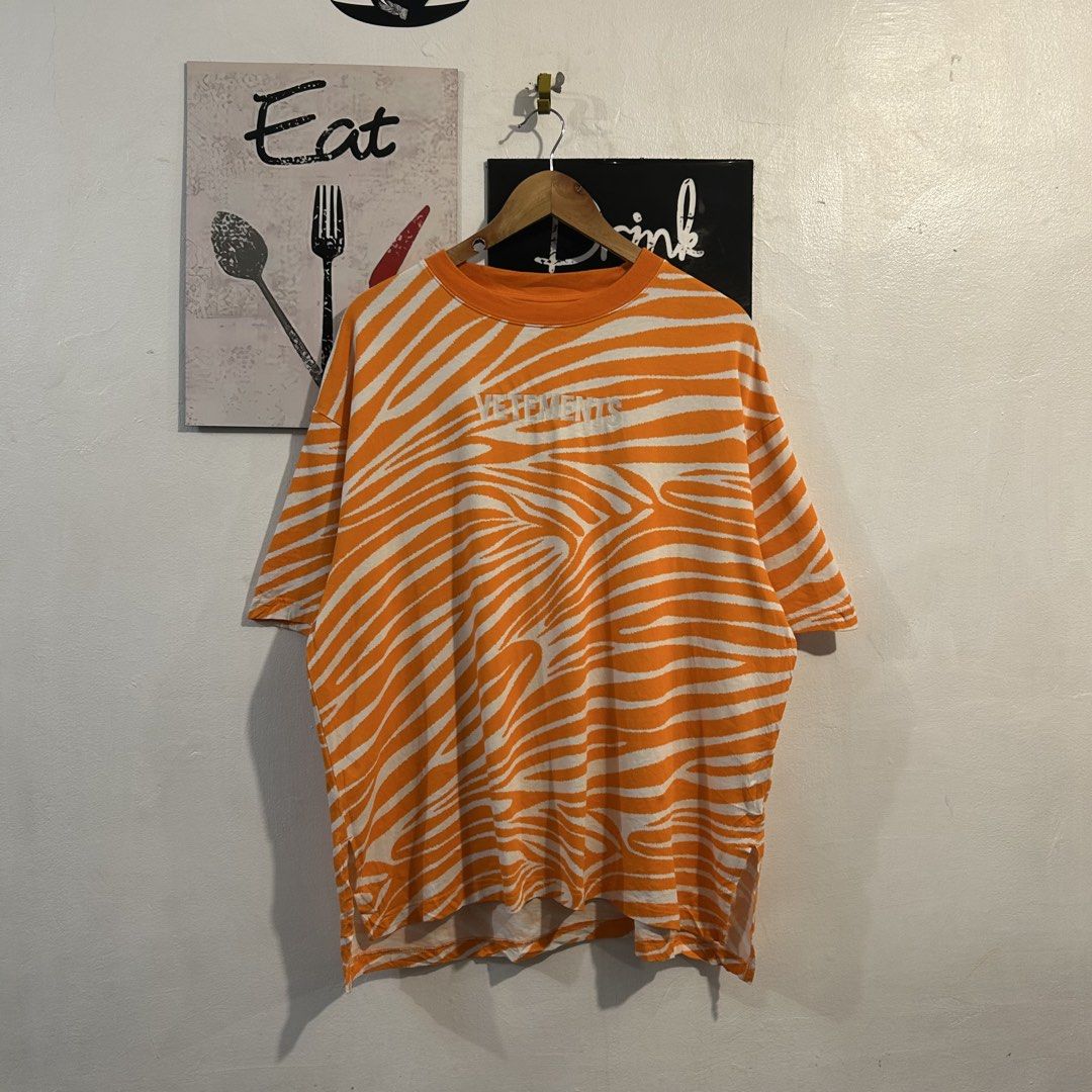 Vetemets Orange Zebra Print T-Shirt (Category: Shirts) located in Manila. Submitted by jakes_thrift_shop (Listing ID 1470310706, Image 1). Description: .
