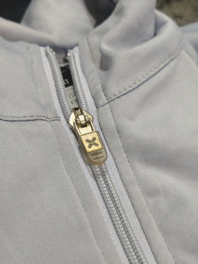Vinrage Nike Clima-FIT Grey Track Jacket (Category: Coats, Jackets and Outerwear) located in Imus. Submitted by angworkinginamo (Listing ID 1470319201, Image 3). Description: Authentic Vintage Nike Clima-Fit Track Jacket Selling this legit vintage Nike windbreaker/track jacket from the early 2000s. Very unique purple, gray, and orange colorway. Perfect for cold weather, motor riding, or casual streetwear outfits. • Size: Large on tag •Dime: 22L x