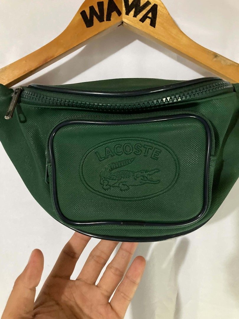 VINTAGE 80S LACOSTE FANNY PACK (Category: Luxury Bags & Wallets) located in Naga. Submitted by wwy3ips (Listing ID 1470247020, Image 3). Description: VINTAGE 80S LACOSTE FANNY PACK ERA: 1980S VINTAGE CONDITION: EXCELLENT CONDITION (SEE PHOTOS) COLOR:*PINE GREEN / DARK GREEN MATERIAL: PVC DIMENSIONS: 25 CM × 13 CM × 6 CM STYLE:CLASSIC VINTAGE SPORTSWEAR.