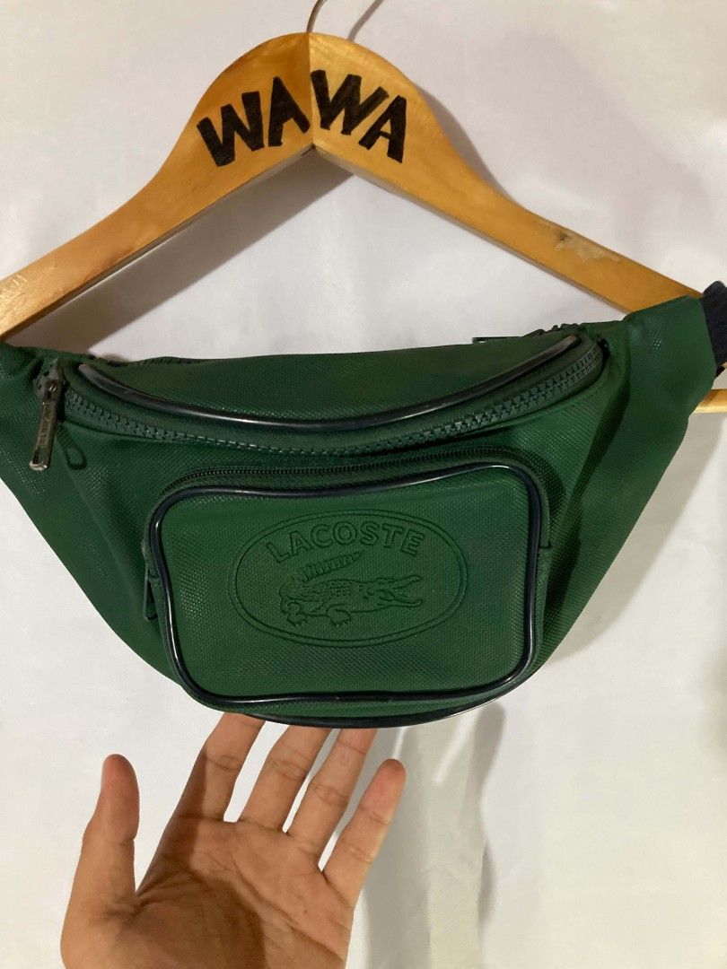 VINTAGE 80S LACOSTE FANNY PACK (Category: Luxury Bags & Wallets) located in Naga. Submitted by wwy3ips (Listing ID 1470247020, Image 2). Description: VINTAGE 80S LACOSTE FANNY PACK ERA: 1980S VINTAGE CONDITION: EXCELLENT CONDITION (SEE PHOTOS) COLOR:*PINE GREEN / DARK GREEN MATERIAL: PVC DIMENSIONS: 25 CM × 13 CM × 6 CM STYLE:CLASSIC VINTAGE SPORTSWEAR.