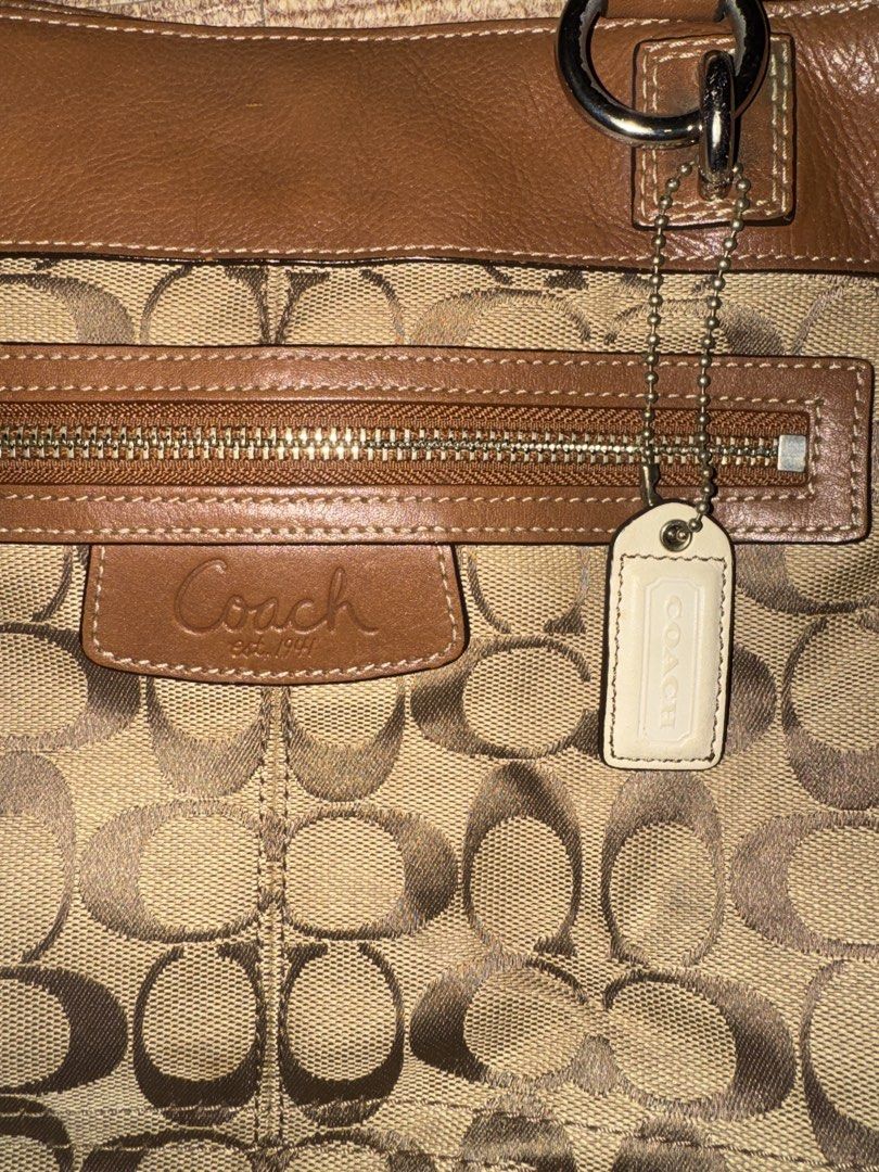 Vintage Coach Bag (Category: Luxury Bags & Wallets) located in Quezon. Submitted by kuromi.bow (Listing ID 1470313543, Image 2). Description: Coach Penelope Signature “C” Shoulder Purse Handbag F15533 Vtg ‘93, Brown leather, jacquard fabric, silver metal, red interior - Condition 9/10, just needs cleaning - Delivery or meetup around qc - Authentic from Korea - Price is negotiable .