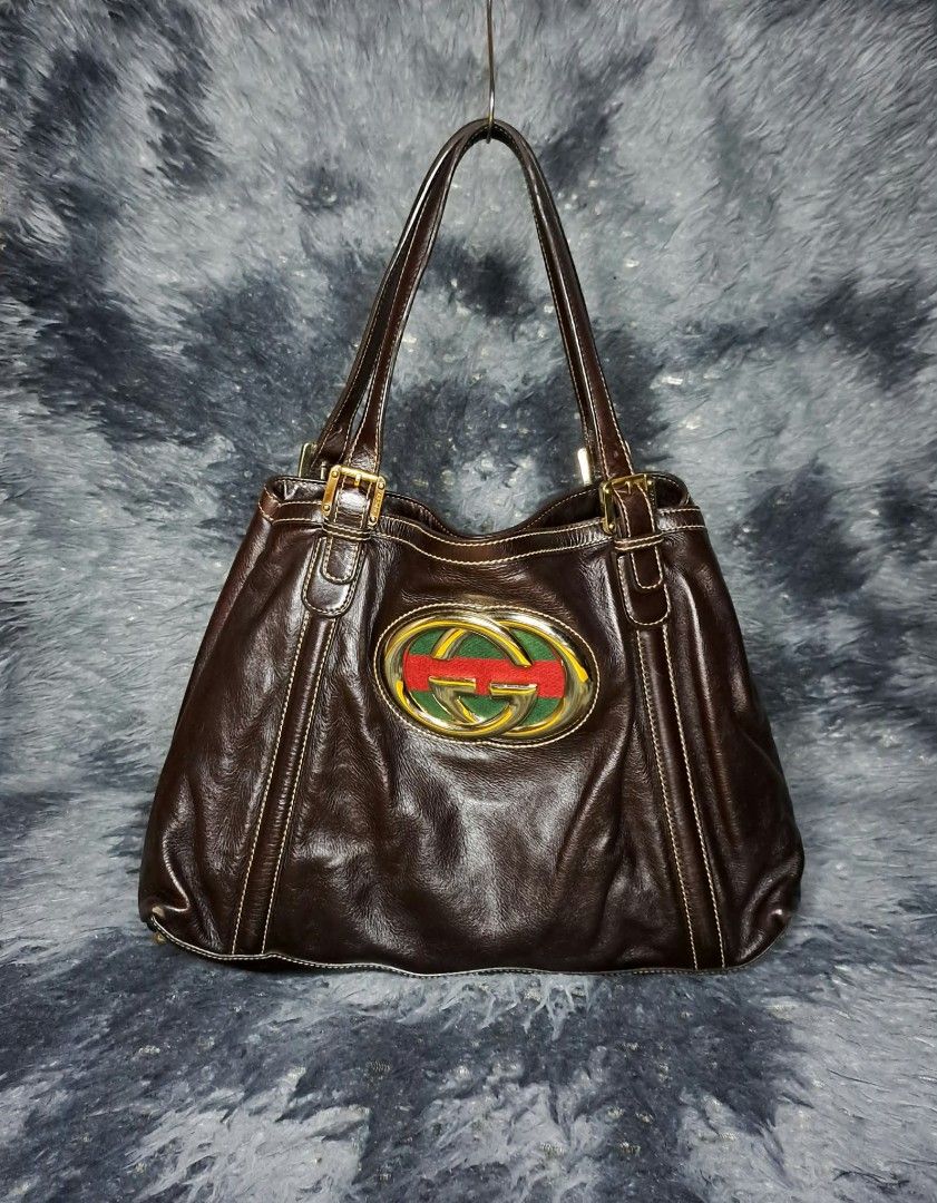 Vintage Gucci Web Britt Tote Bag (Category: Luxury Bags & Wallets) located in Quezon City. Submitted by yaseen73 (Listing ID 1470344099, Image 1). Description: 🔥Pre - Owned / Declutter🔥 Vintage Gucci Britt Tote Bag Mid - Early 2000's ✔️ Prestine Condition ✔️ With Minor Marks of Usage ✔️ I Bought it in Switzerland ✔️ Not Longer Needed Specific Details : ✔️ Line / Collection : Gucci Britt ✔️ Material : Supple Grained Dark Brown / Chocolate Calfsk