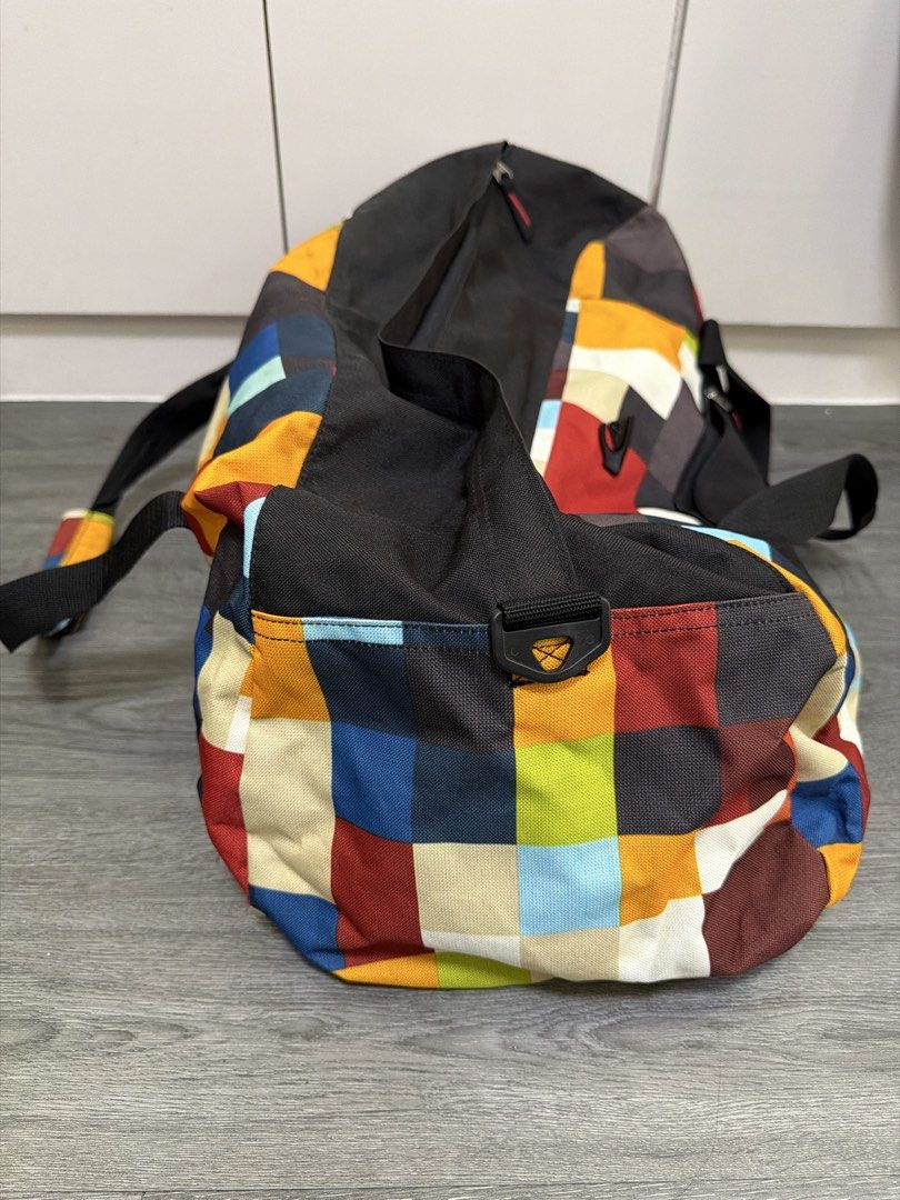 Vintage Quiksilver Duffel Bag (Category: Sling Bags) located in Manila. Submitted by hola.koala (Listing ID 1470212885, Image 3). Description: - Authentic - Spacious main compartment and convenient front zip pocket for easy organization - all zippers working - Includes a detachable black shoulder strap with a comfortable padded grip - Perfect size for gym sessions, sports gear, or weekend trips .