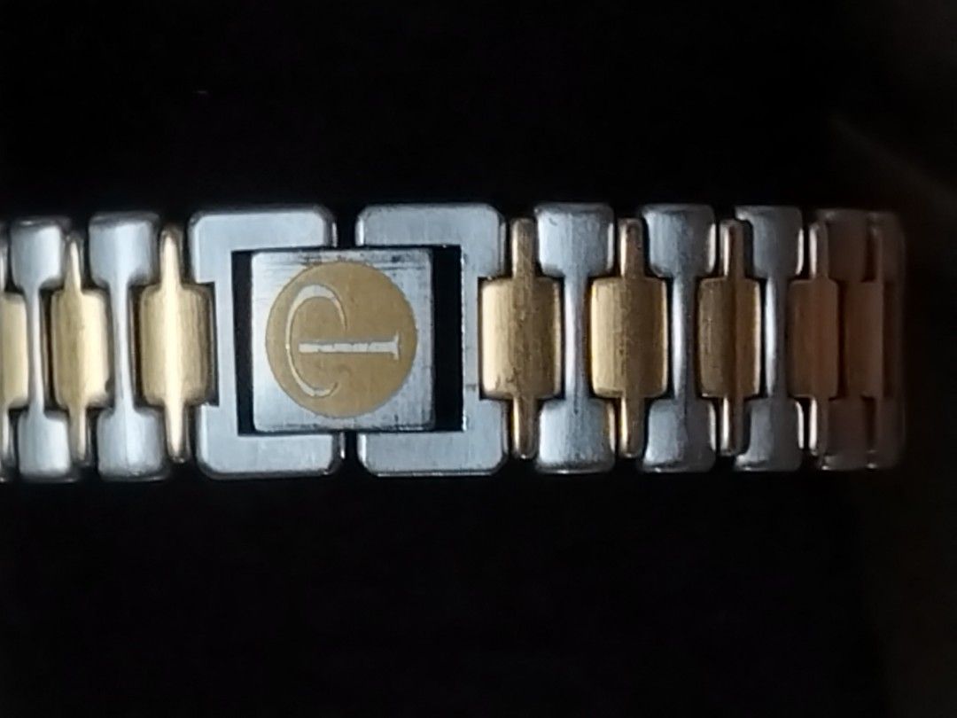 Vintage Seiko Presage Quartz (Category: Luxury Watches) located in Manila. Submitted by chixs_timepiece (Listing ID 1470227698, Image 1). Description: - Brand: Seiko Presage - Movement: Battery-operated quartz - Dial: White dial with date window at the bottom - Design: Two-tone silver and gold bracelet links with branded logo clasp - Case Back: Stainless steel with stamped serial numbers - Condition: Normal wear on case and bracelet from regular 