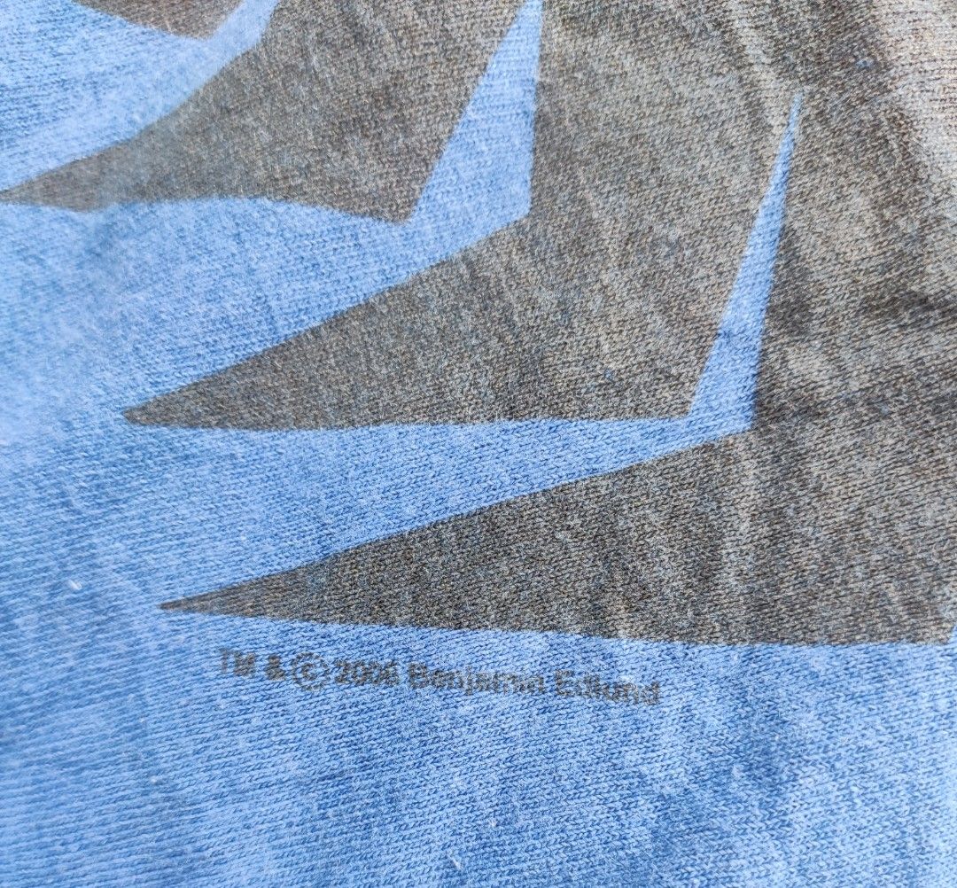 Vintage The Tick 2004 Graphic T-Shirt Blue Size L (Category: Tshirts & Polo Shirts ) located in Manila. Submitted by janablanks77380 (Listing ID 1470166708, Image 3). Description: - Official 2004 Benjamin Edlund The Tick graphic tee - Brand: Gildan Ultra Cotton tag, size Large 22 x 27.5 - Material: 100% preshrunk cotton for comfort - Color: Vibrant royal blue - Fit: Classic short sleeve, regular fit - Condition: Screen print shows minor vintage w