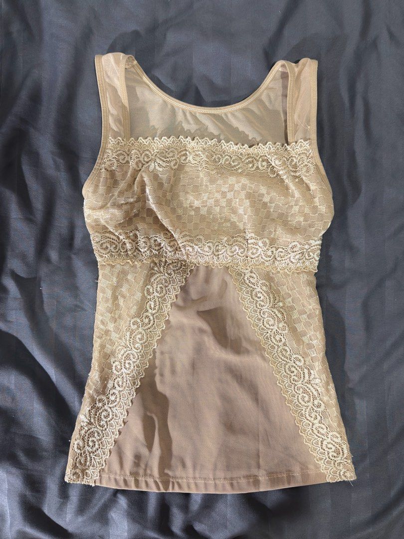 Vintage Top (Category: Sleeveless) located in Cavite. Submitted by mevynn (Listing ID 1470162167, Image 1). Description: bought in instagram what you see is what you get size: xs-s body hugging fave ⭐️⭐️⭐️ 💳 gotyme, gcash or BPi 🚚 lalamove or jnt.