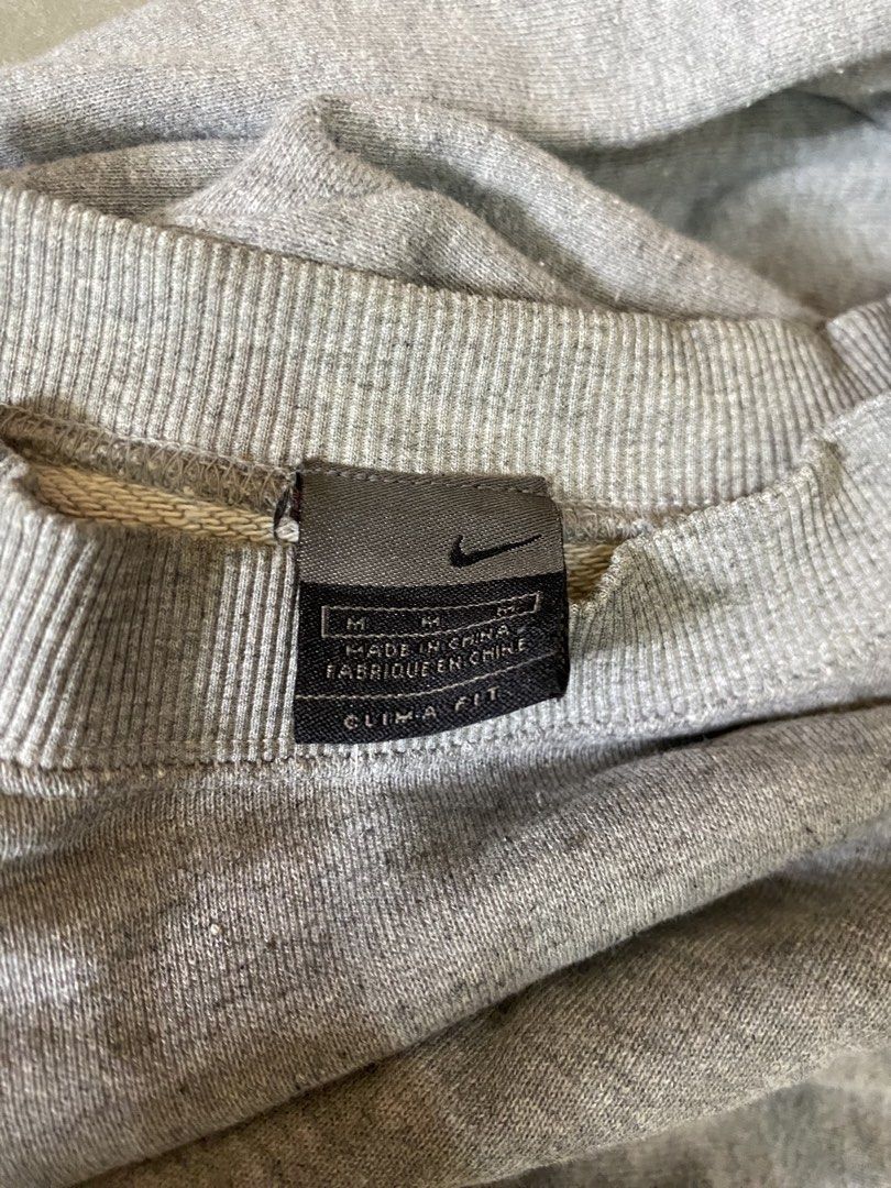 VINTAGE/Y2K Nike Sweater (Category: Coats, Jackets and Outerwear) located in Cainta. Submitted by rurufinds (Listing ID 1470201453, Image 2). Description: 1990s Nike Gray Sweater Good Condition Washable stain on cuff BOXY FIT!!! -L: 25.5 -W: 23 Php 499 + Sf Cainta location.