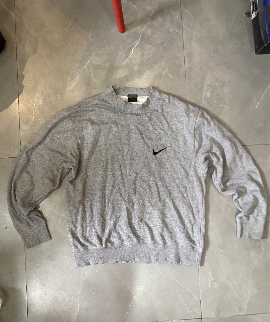 VINTAGE/Y2K Nike Sweater (Category: Coats, Jackets and Outerwear) located in Cainta. Submitted by rurufinds (Listing ID 1470201453, Image 1). Description: 1990s Nike Gray Sweater Good Condition Washable stain on cuff BOXY FIT!!! -L: 25.5 -W: 23 Php 499 + Sf Cainta location.