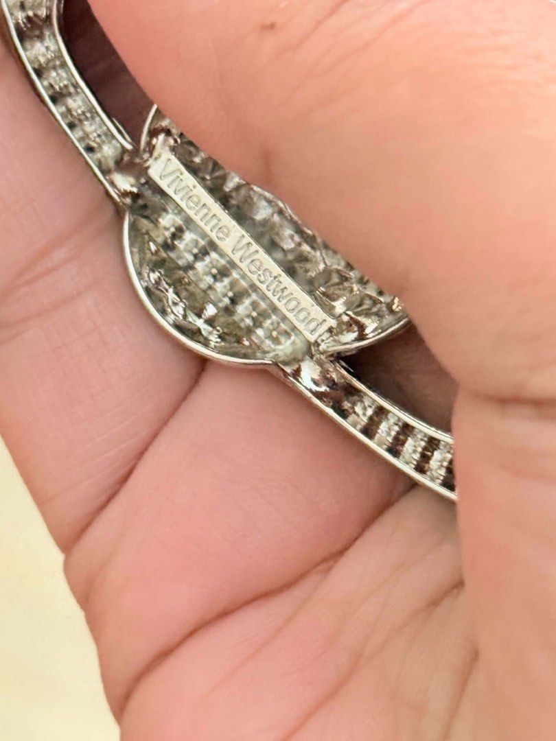 Vivienne Westwood brooch (Category: Brooches) located in Cebu City. Submitted by simpleabundance (Listing ID 1470240317, Image 3). Description: authentic silver tone.