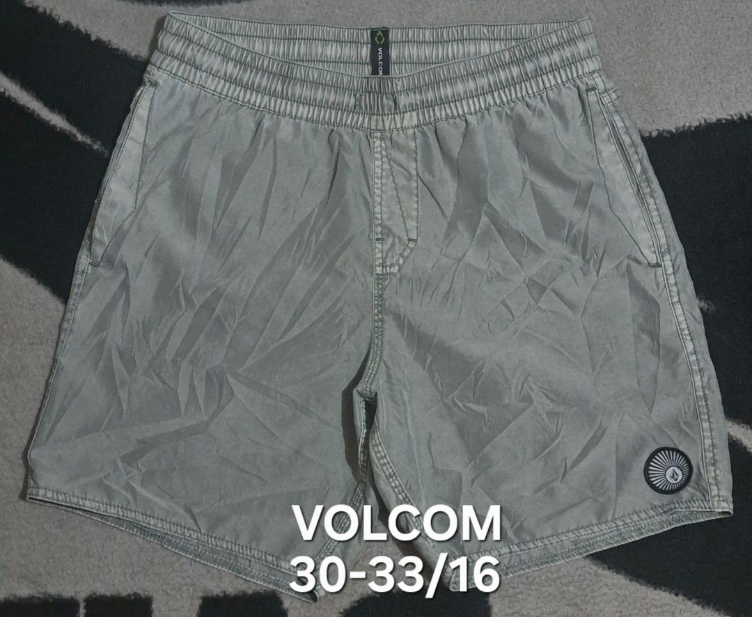 Volcom Grey Boardshorts Size S (Category: Swim Trunks & Board Shorts) located in San Fernando, Camarines Sur. Submitted by ladderaya (Listing ID 1470241116, Image 1). Description: - Brand/Model: Volcom grey shorts - Size: S - Waistband: Elastic with adjustable drawstring - Pockets: Convenient side pockets and one back pocket with Volcom True To This label - Details: Round Volcom logo patch near the bottom hem - Material: Lightweight fabric, ideal