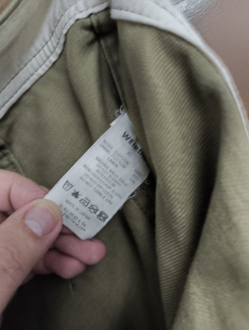 Weirdo Utility Pants (Category: Jeans) located in San Pedro. Submitted by madvillainkicks (Listing ID 1470152772, Image 3). Description: - Brand/Model: Glad Hand & Co. Weirdo Utility Pants - Color: Olive Green - Size: XL - Material: 85% cotton, 15% linen blend (body and lining) - Origin: Made in Japan - Fit: Relaxed wide leg with vintage military workwear aesthetic - Details: Front and back patch pockets, secret 'FUCK U?' graphic printed on the i
