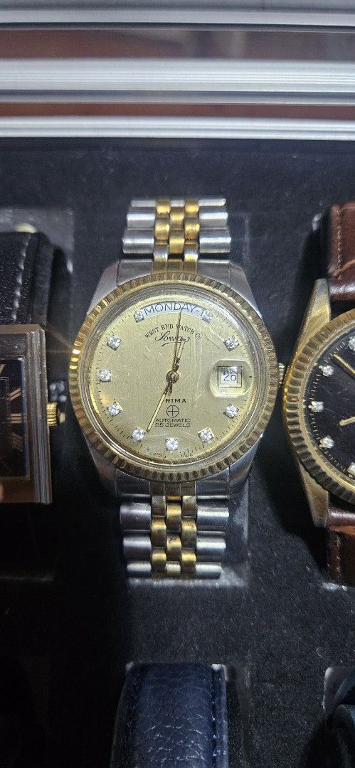 West End Watch Co Sowar Prima Automatic Watch (Category: Men's Watches) located in Santa Maria. Submitted by rommelmateo (Listing ID 1470215851, Image 1). Description: - Brand/Model: West End Watch Co Sowar Prima Automatic - Dial: Gold dial with sparkling rhinestone hour markers - Features: Fluted bezel and convenient day-date window at 3 o'clock - Bracelet: Stylish two-tone jubilee bracelet (stainless steel and gold-tone) - Condition: Keeps time