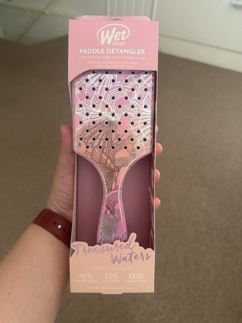Wet Brush Paddle Detangler Treasured Waters Sea Shells (Category: Hair) located in Las Pinas. Submitted by trueflower_125fe9 (Listing ID 1470336752, Image 3). Description: - Authentic Wet Brush Paddle Detangler from the Treasured Waters collection (Sea Shells - Pink with metallic seashell design) - Brand new and still in original unopened packaging - AquaVent technology allows for fast drainage and easy cleanup in the shower - Ultra-soft IntelliF