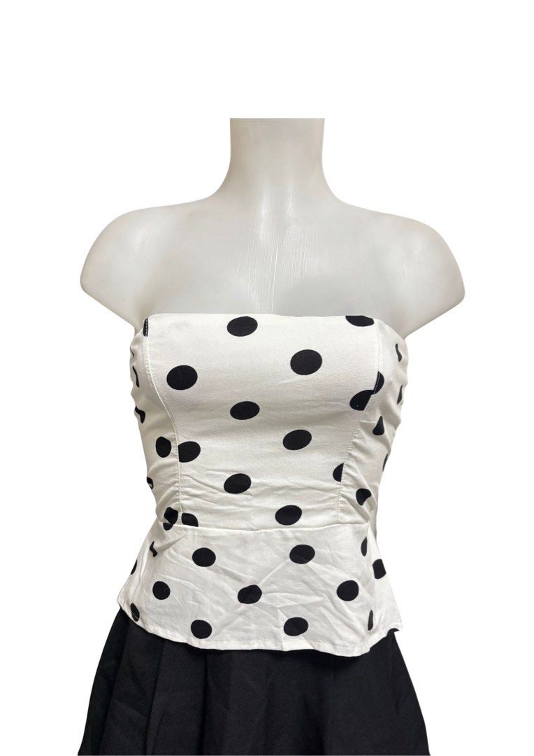 White Black Polka Dot Tube Top (Category: Sleeveless) located in Caloocan City. Submitted by shibowhii (Listing ID 1470225314, Image 1). Description: - Color/Pattern: White with all-over black polka dots - Fit: Structured front bodice with seams + stretchy smocked elastic back panel - Design: Flared peplum hem at the waist .