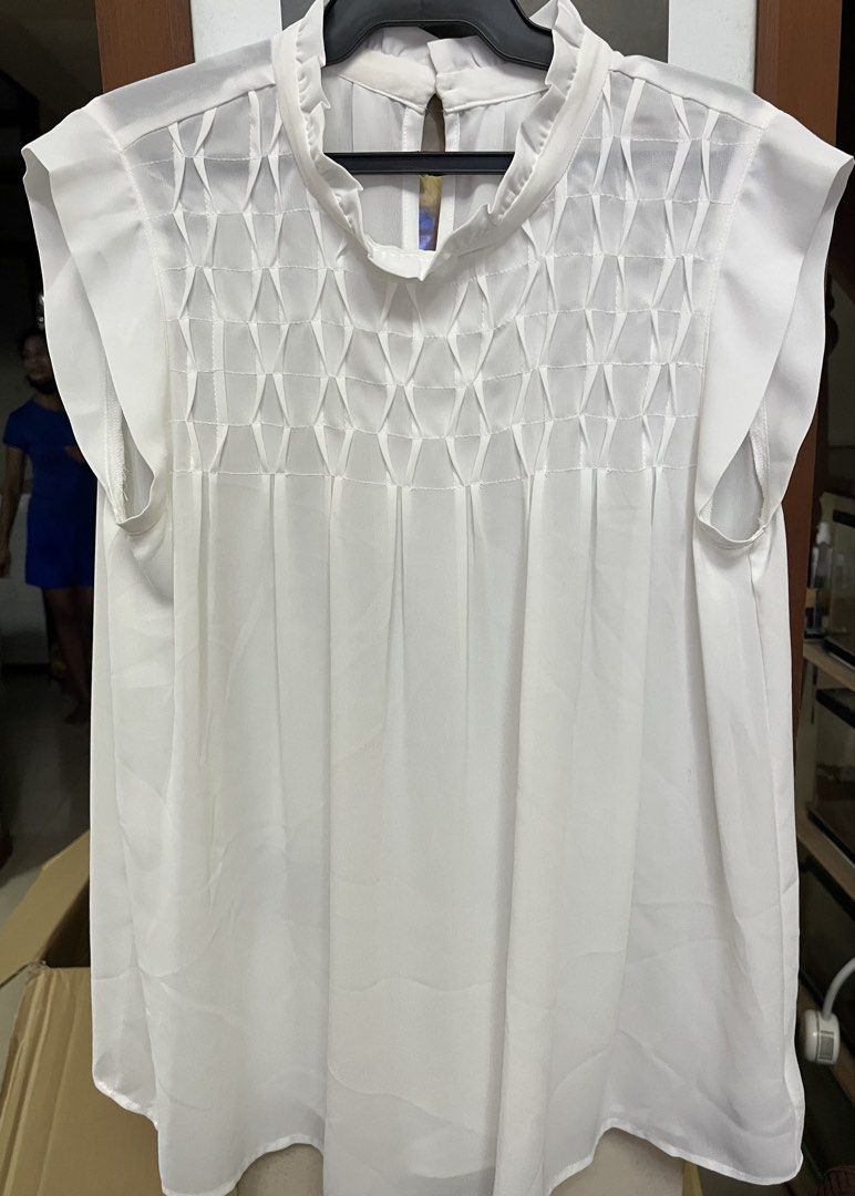 White blouse (Category: Blouses) located in Bacoor. Submitted by ayit. (Listing ID 1470267367, Image 1). Description: Orig personal japan s used - Color: White - Brand: Japan brand - Size: M (EU 38 / UK 10 / US 6) - Design: Elegant front smocked detailing and back keyhole with button closure - Condition: 4/5 (well-maintained) - Style: Lightweight, versatile, great for casual or office wear.