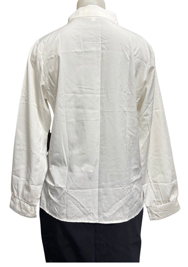 White Button-Up Long Sleeve Shirt (Category: Longsleeves) located in Caloocan City. Submitted by shibowhii (Listing ID 1470233936, Image 2). Description: .