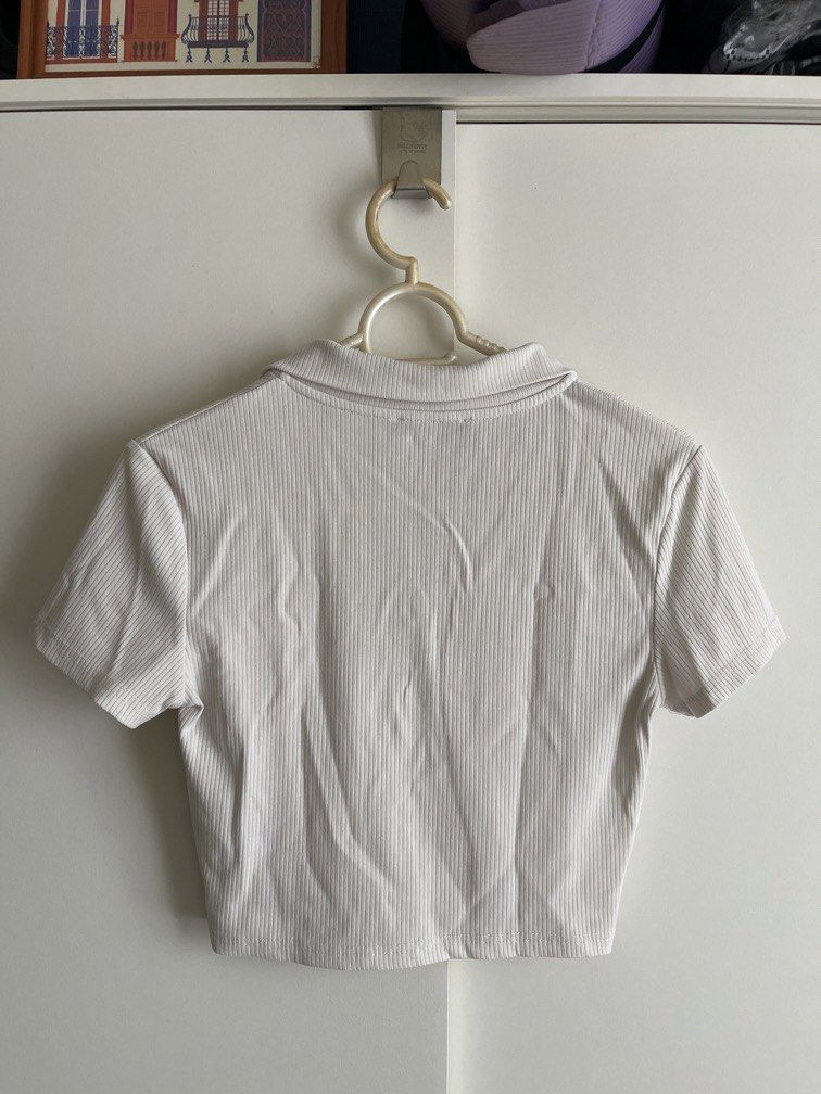 White collared crop top (Category: Shirts) located in Makati City. Submitted by eatedthemoon (Listing ID 1470156497, Image 3). Description: • S on tag, but runs pretty small, XS-S rfs: decluttering.