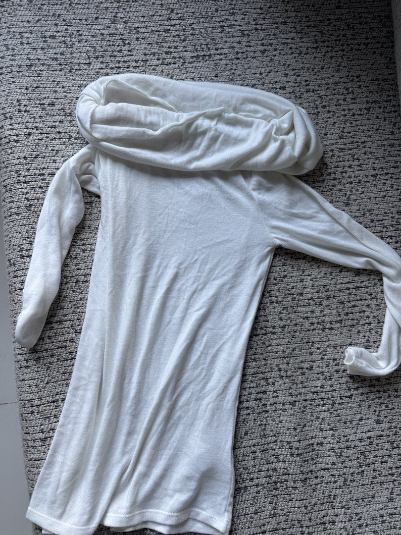 White Cowl Neck Long Sleeve Knit Sweater (Category: Coats, Jackets and Outerwear) located in Manila. Submitted by billiebrown (Listing ID 1470154363, Image 1). Description: - Color: White - Style: Slim fit with a big cowl neck - Material: Soft, comfortable knit fabric - Sleeves: Long sleeves with a slightly relaxed finish - Versatility: Perfect basic for layering, easy to match with jeans or skirts - Condition: Brand new / Excellent pre-loved.