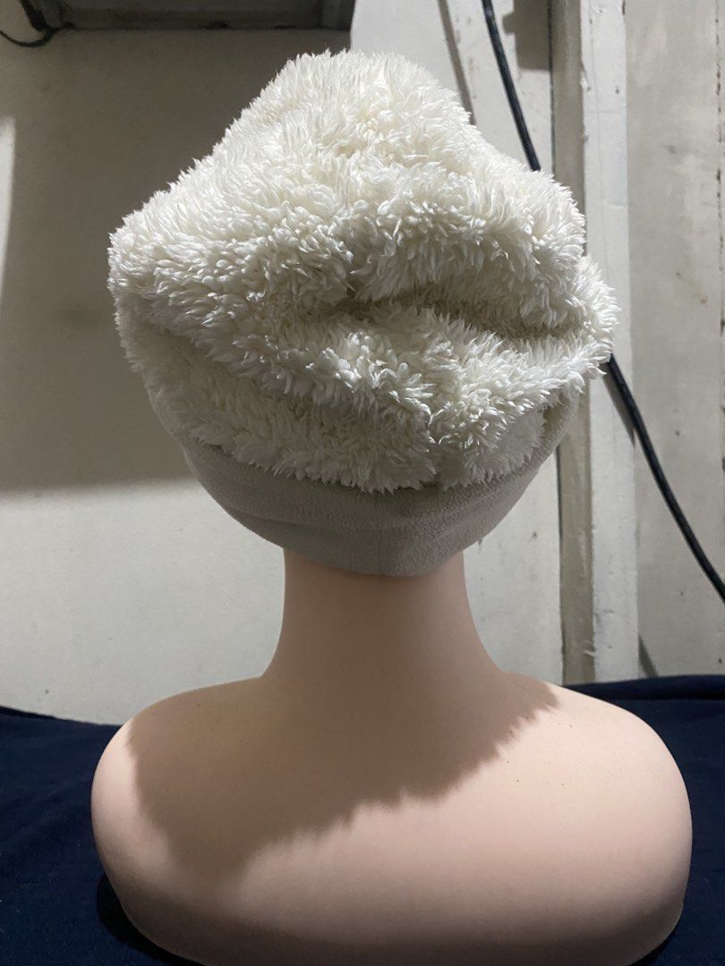 White Fleece Beanie Winter Hat (Category: Hats & Beanies) located in Manila. Submitted by resi.diaz (Listing ID 1470329180, Image 2). Description: - Fluffy white winter hat made of soft fleece - Double-layered design with textured faux sherpa outer and smooth fleece inner - Keeps your head extra warm during cold weather - Stretchy fit that comfortably accommodates most head sizes - Versatile clean white color matches any winter coat or jacket.