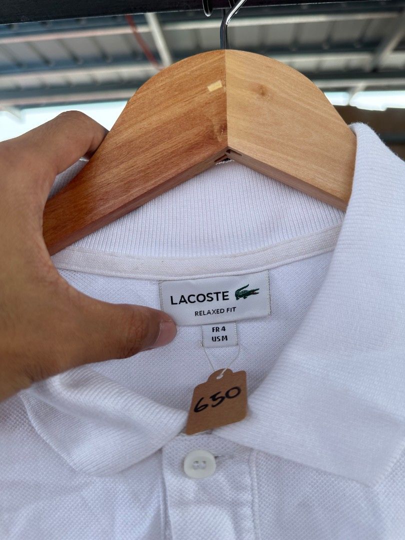 White lacoste polo shirt (Category: Tshirts & Polo Shirts ) located in Davao. Submitted by boss_kel (Listing ID 1470145934, Image 3). Description: No washtag mga bossing, Not sure kung pasok o hindi. Pero panalo condition neto.