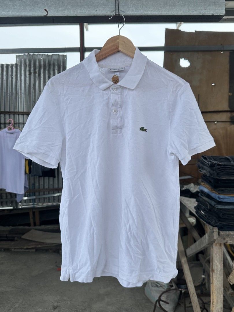 White lacoste polo shirt (Category: Tshirts & Polo Shirts ) located in Davao. Submitted by boss_kel (Listing ID 1470145934, Image 1). Description: No washtag mga bossing, Not sure kung pasok o hindi. Pero panalo condition neto.
