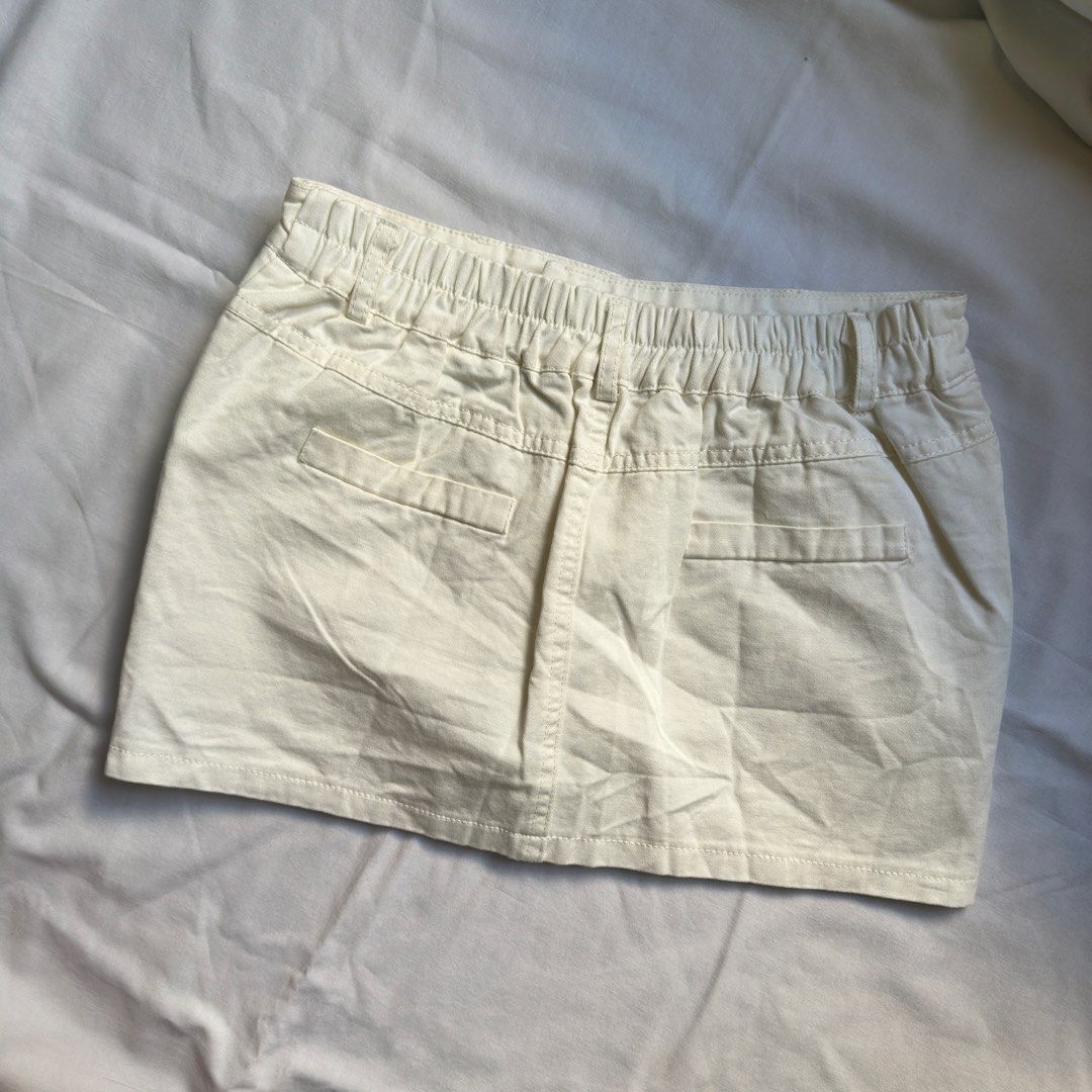 White Mini Micro Denim Skirt (Category: Skirts) located in Quezon City. Submitted by danalou (Listing ID 1470219642, Image 2). Description: size 26"-28" length 12" with inner shorts never used, no when worn.