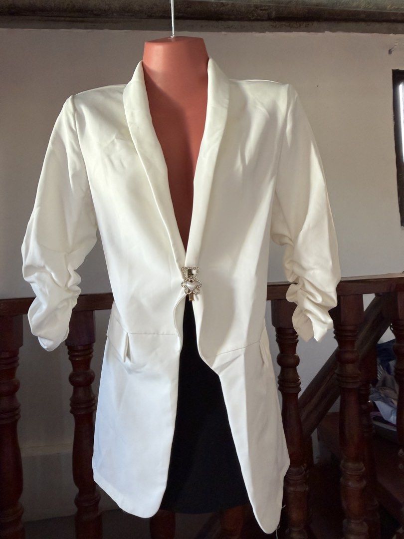 White Ruched Sleeve Blazer Open Front Jacket (Category: Coats, Jackets and Outerwear) located in Calapan. Submitted by lesleiann (Listing ID 1470200165, Image 2). Description: - Color: White - Style: Open front with shawl lapel - Sleeves: 3/4 length ruched sleeves - Details: Structured shoulders and smooth, high-quality fabric (with shoulder pads) - Versatility: Perfect for workwear or smart-casual looks.