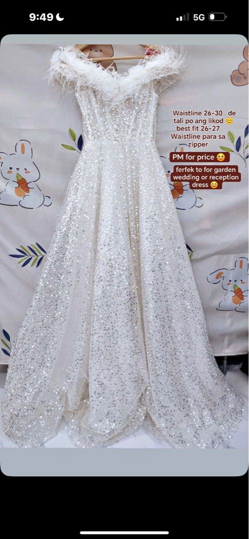 White Sequin Off-Shoulder Wedding Reception Dress with Feathers (Category: Evening dresses & gowns) located in Caloocan City. Submitted by jonnamae_339 (Listing ID 1470296144, Image 1). Description: - Color/Design: White sparkly sequin dress with fluffy feather-trimmed off-shoulder neckline - Occasion: Ideal for garden weddings and evening reception parties - Waist Fit (Lace-up): Fits 26 to 30 inches using the adjustable back ties - Waist Fit (Zi