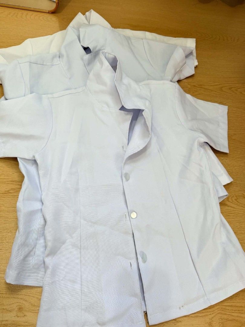 White short sleeve uniform tops blouses shirts (Category: Shirts) located in Manila. Submitted by coolcrystal_59d22e (Listing ID 1470179547, Image 2). Description: - Bundle of classic white short sleeve uniform blouses - Features a neat collar and button-down front - Clean fabric with quality stitching - Versatile plain white design - Perfect for daily work, school uniform, or nursing wear.