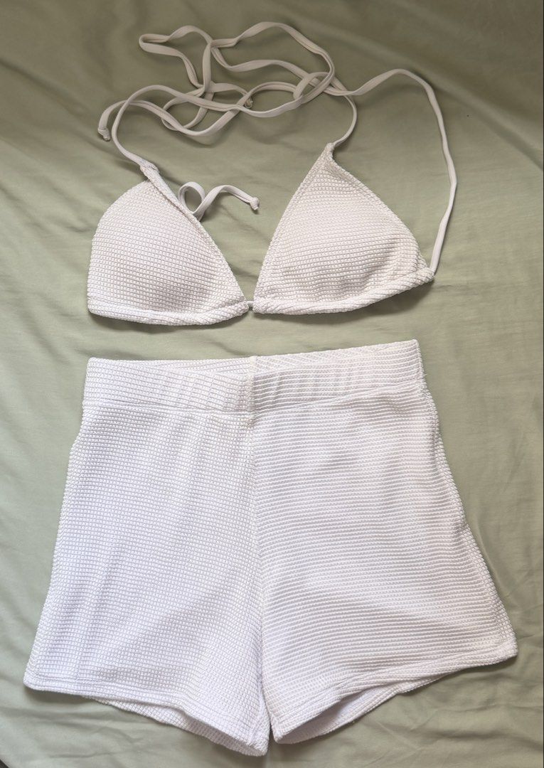 White Textured Bikini Set With Shorts Size M (Category: Bikinis & Swimsuits) located in Dinalupihan. Submitted by wonmeoww (Listing ID 1470252277, Image 1). Description: - Style: White two-piece swimsuit set with triangle halter top and high-waisted shorts - Size: Medium - Condition: Clean and well-maintained.