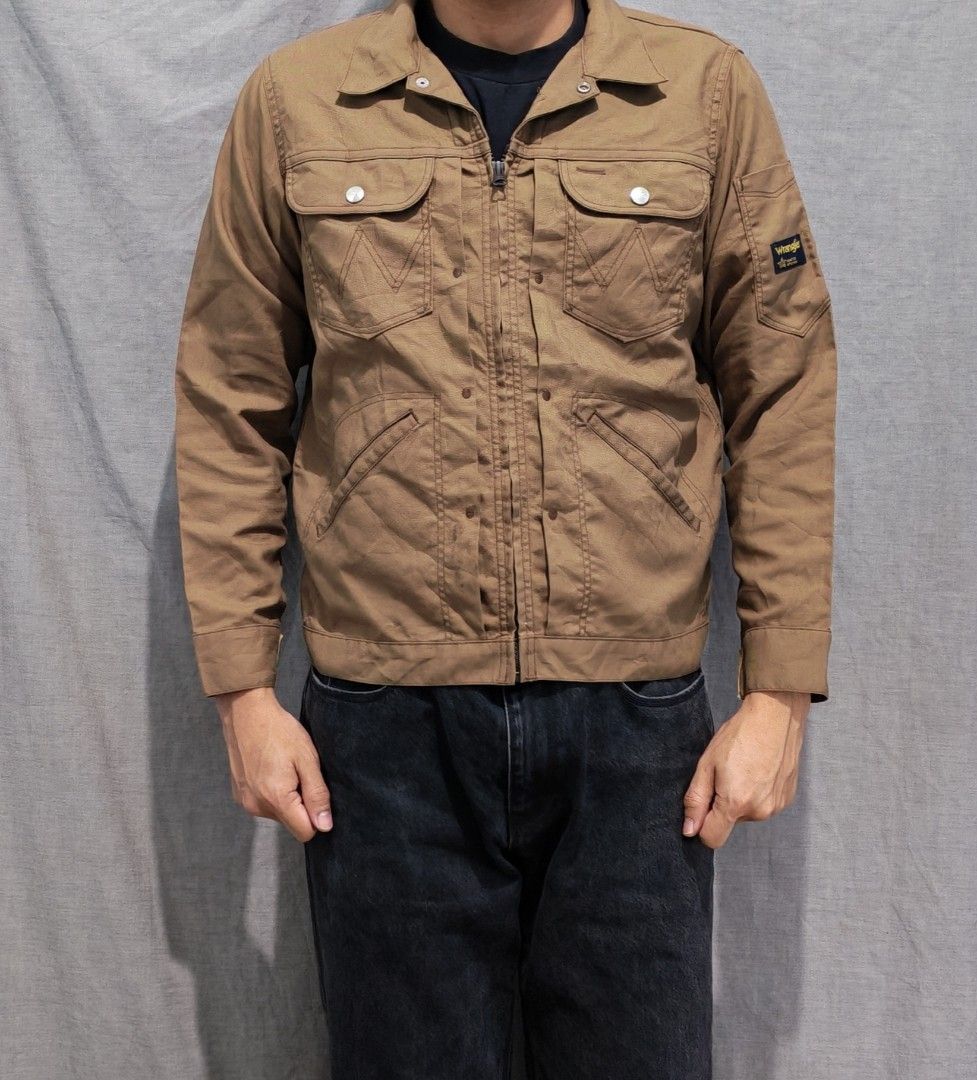 Wrangler lightweight work jacket (Category: Coats, Jackets and Outerwear) located in Baguio. Submitted by used_clothing2600 (Listing ID 1470183094, Image 1). Description: Wrangler lightweight work jacket size small good condition issue stains / cuffs snap button change to velcro straps width 21 length 24 shoulders 15.5 sleeve length 22 P 880.